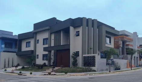 imagem 1 - Casa assobradada à venda de 290m² | 04 domitórios, sendo suítes e 04 vagas de garagem | Condomínio Malibu | Caçapava. imagem 1 - Casa assobradada à venda de 290m² | 04 domitórios, sendo suítes e 04 vagas de garagem | Condomínio Malibu | Caçapava.